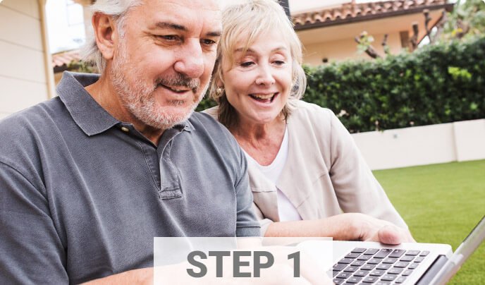 Older couple looking at laptop